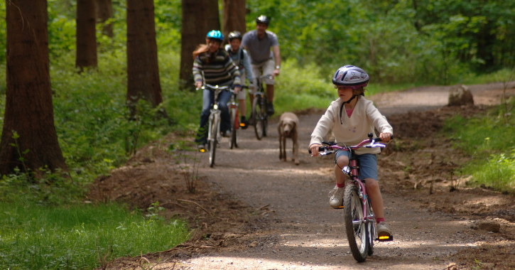 Family enjoying a bike ride in Hamsterley Forest.